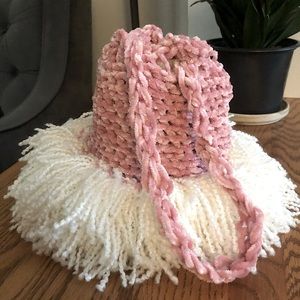 Pink, small, crochet Drawstring handbag.